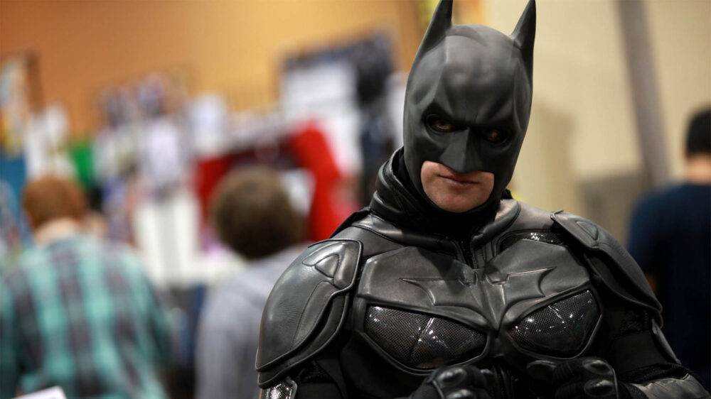 Batman (hier ein kostümierter Gast einer Comicmesse) ist Atheist, legt der neue Band der Comic-Reihe nahe