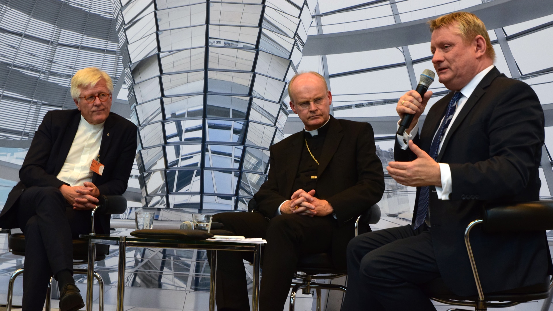 Sprecher beim Kongress der Union im Deutschen Bundestag: (v.l.) Heinrich Bedford-Strohm, Franz-Josef Overbeck und Herrmann Gröhe