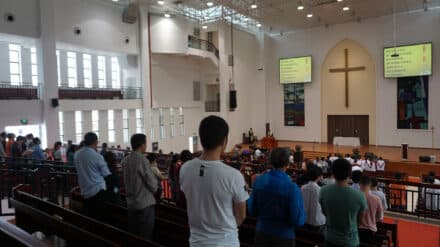 Chinesische Christen feiern einen Gottesdienst